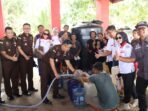 Kejati Sulut Salurkan Air Bersih